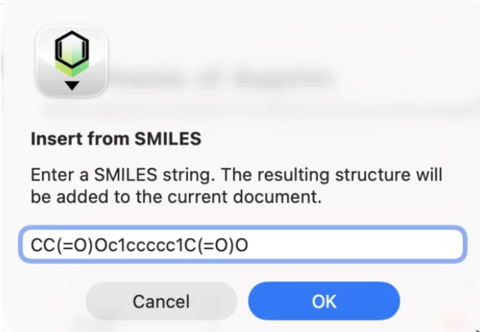 The Insert from SMILES dialog with the SMILES of aspirin typed in